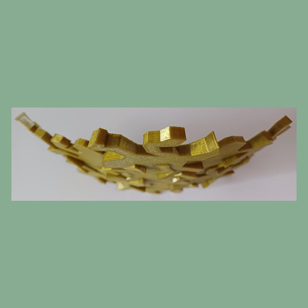 Top view of connected Escher inspired lizards snapped together showing the intended outwards curve used for decoration.